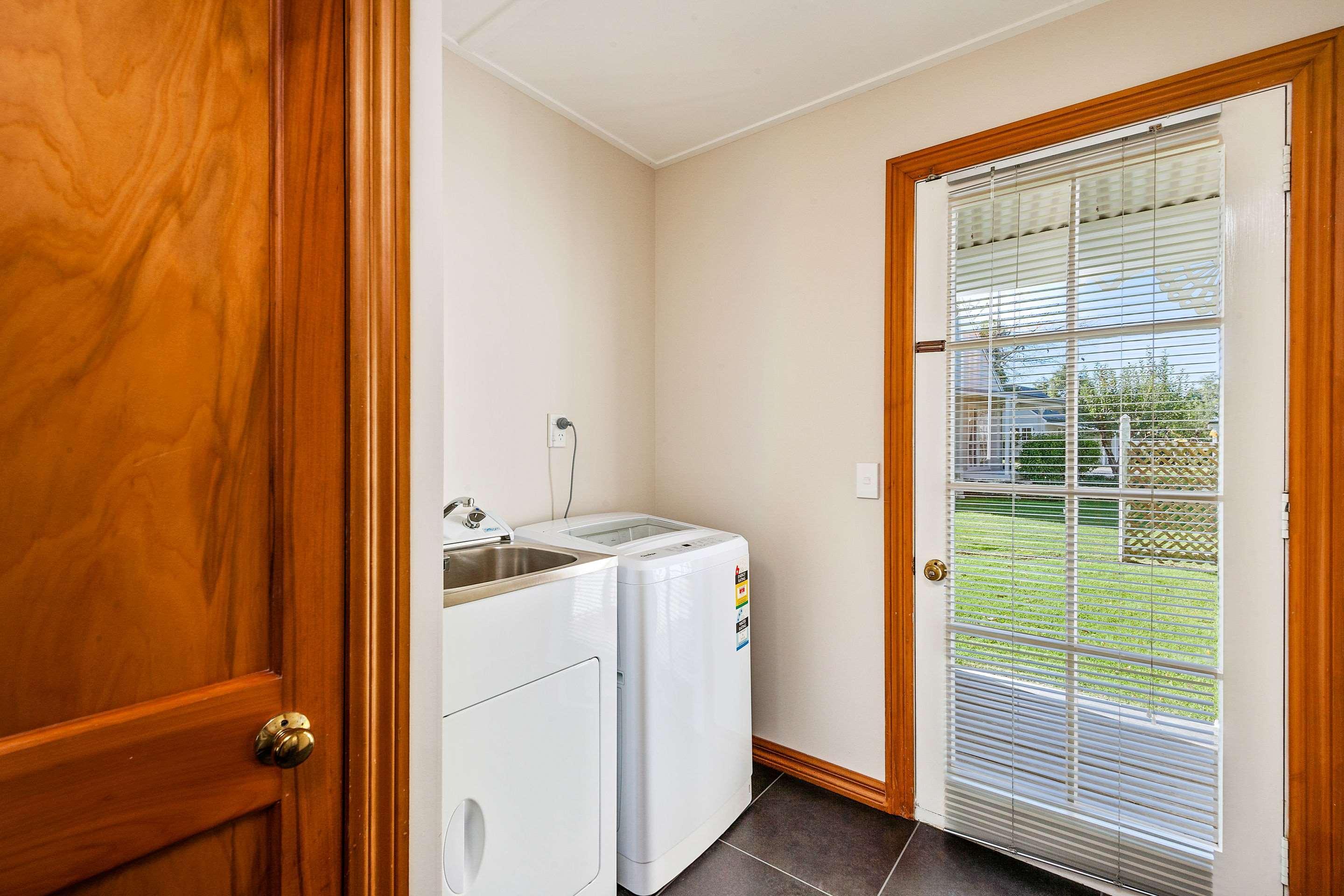 Huka Falls Resort Taupo Exteriér fotografie A laundry room in a house